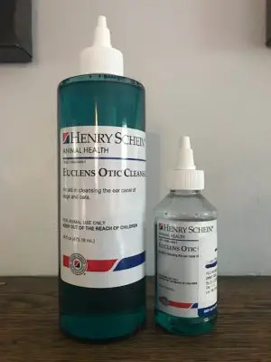 image shows best product to clean dog's ears which is Henry Schein Euclens Otic Cleaner. Side by side comparison of vet size 4oz. vs. 16oz. size.